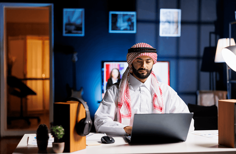 Startup founder at a workstation